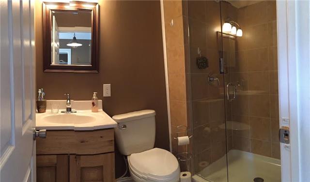 403 North Oak Street Springfield, TN 37172 - Photo 7 of 20 a bathroom with a sink toilet and shower