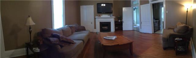 403 North Oak Street Springfield, TN 37172 - Photo 10 of 20 a living room with furniture and a fireplace