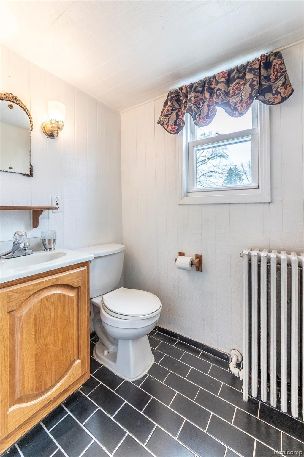 10633 Stark Road Livonia, MI 48150 - Photo 31 of 37 Half bathroom on the upper level