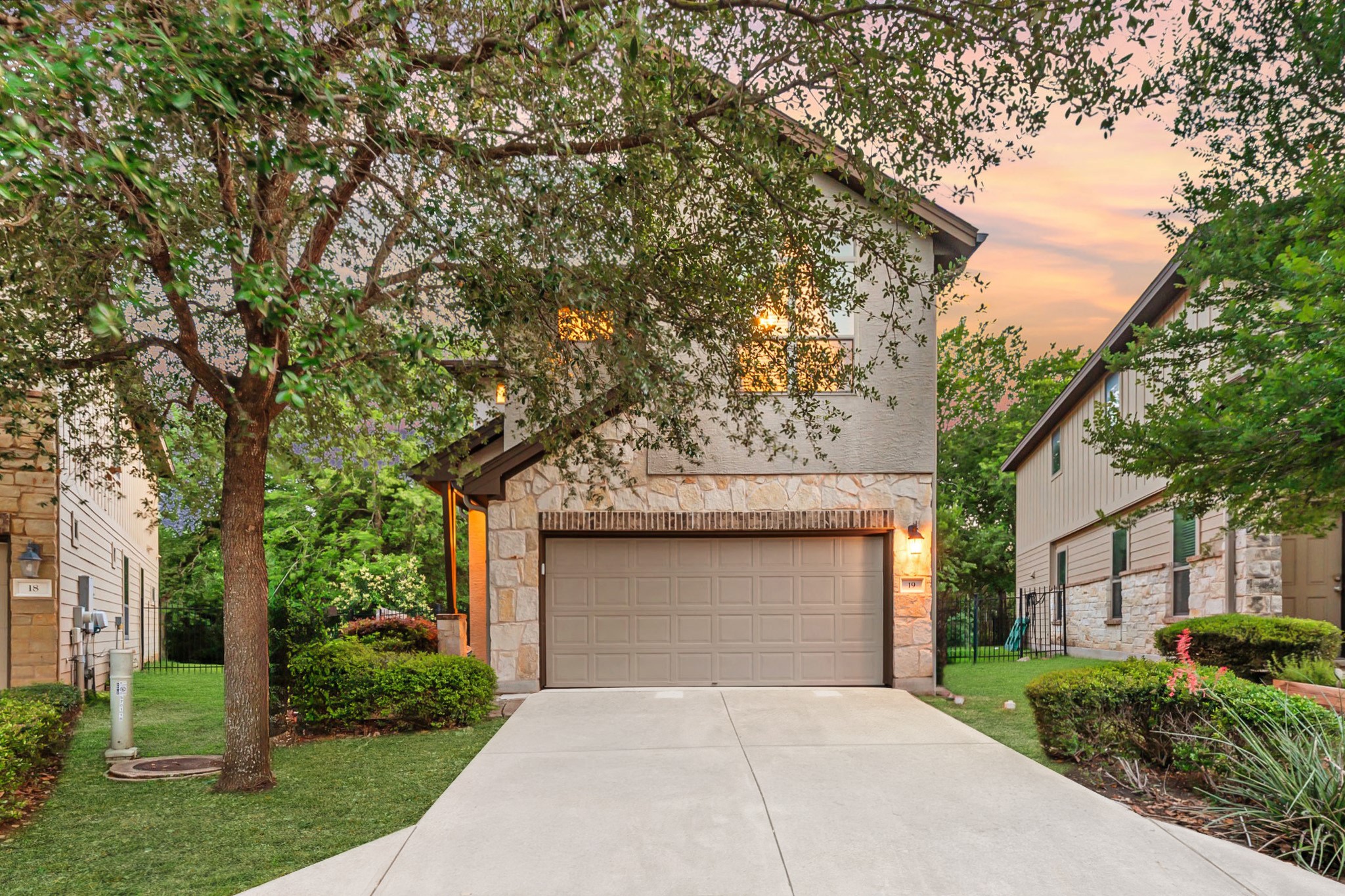 2101 Rivers Edge Way, Unit 19 Austin, TX 78741 - Photo 5 of 24 front view of a house with a garden