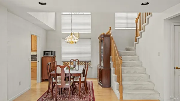 a view of a dining room with furniture