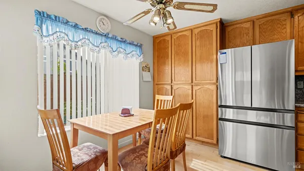 a kitchen with stainless steel appliances granite countertop a sink and cabinets