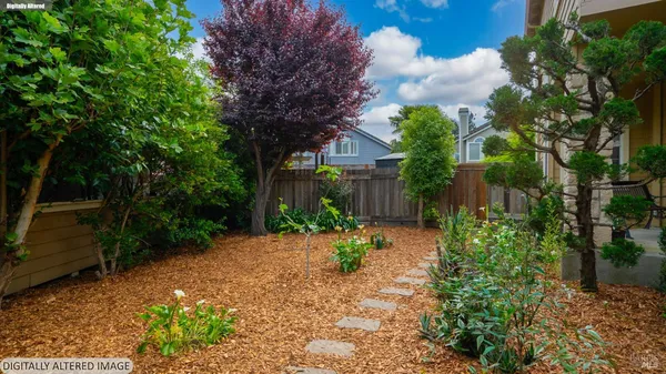 a backyard of a house with lots of green space