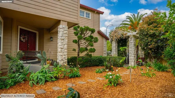 a front view of a house with a garage