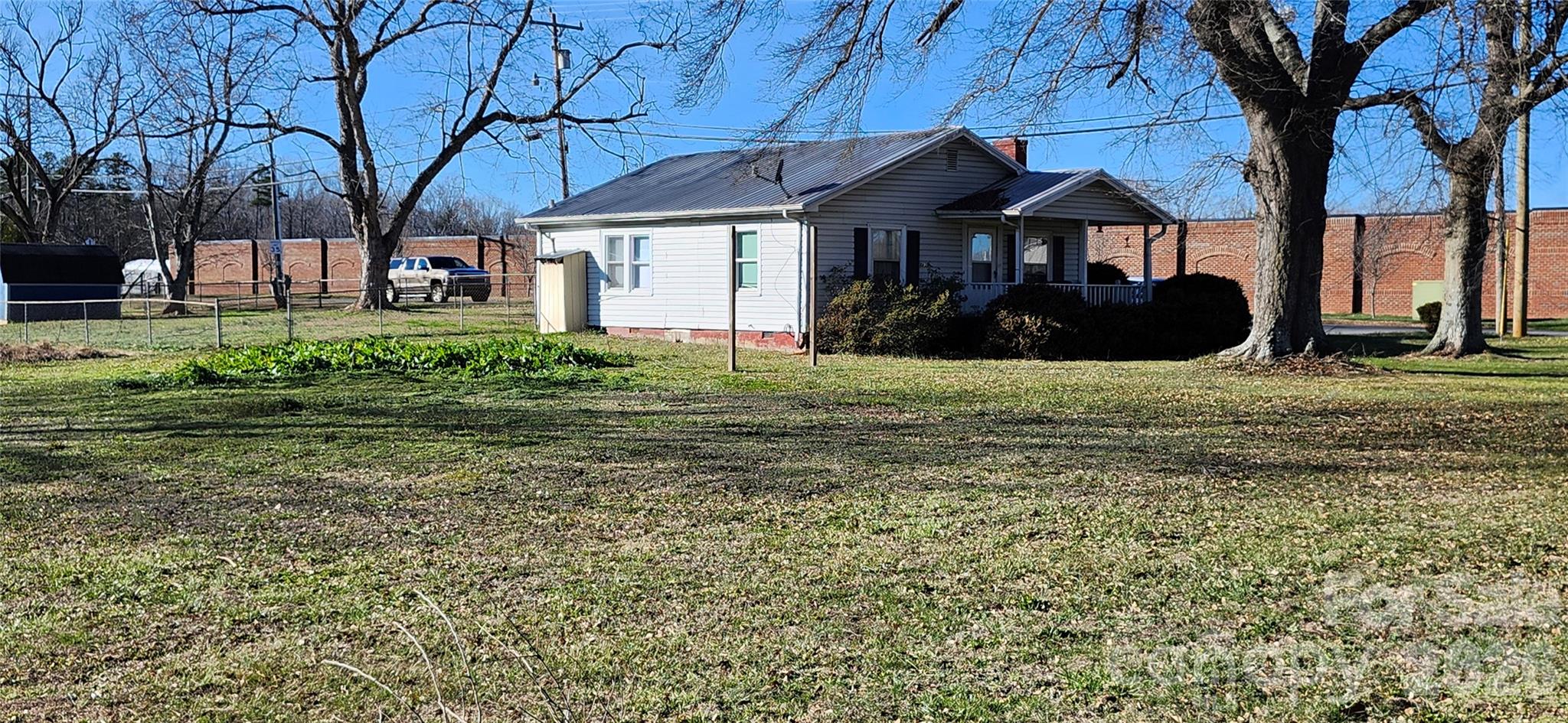 101 Gaither Road Belmont, NC 28012 - Photo 3 of 8 a front view of a house with garden