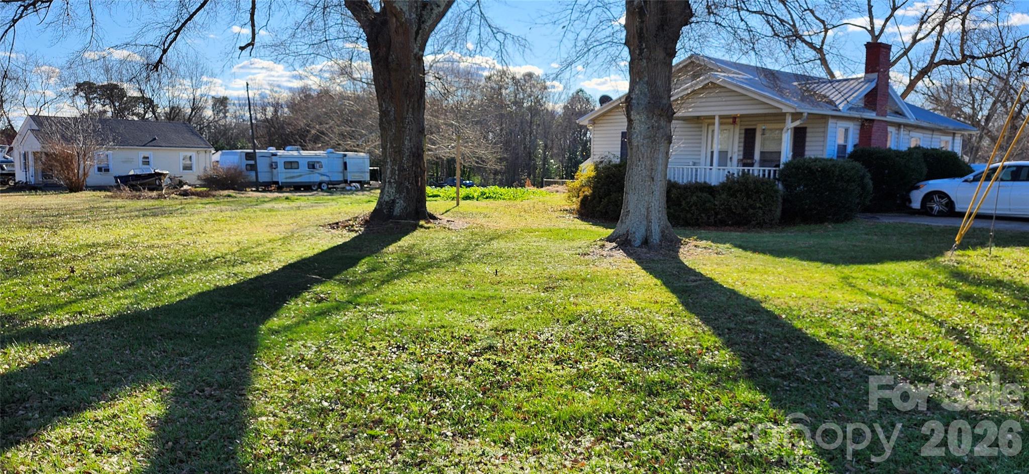 101 Gaither Road Belmont, NC 28012 - Photo 4 of 8 a view of a house with swimming pool