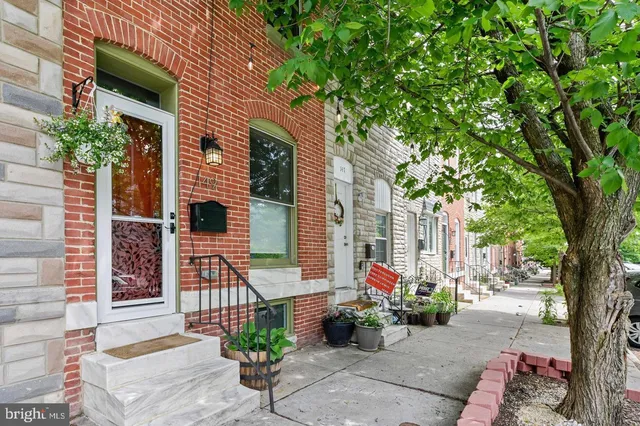 a front view of a house with a patio