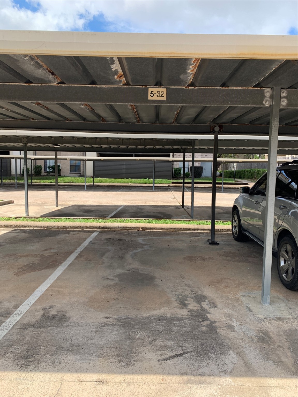 3005 Walnut Bend Lane, Unit 32 Houston, TX 77042 - Photo 2 of 26 a view of a parking area