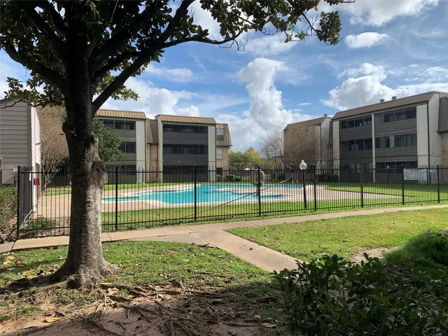 a view of outdoor space yard and swimming pool