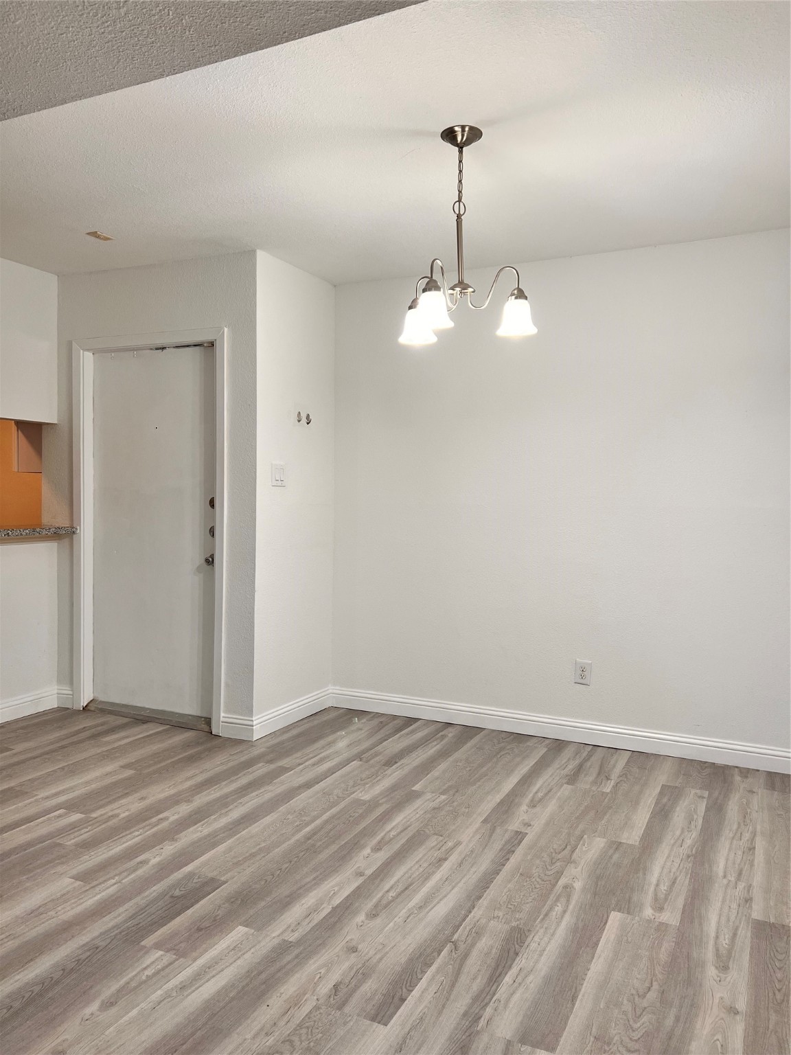 3005 Walnut Bend Lane, Unit 32 Houston, TX 77042 - Photo 5 of 26 a view of an empty room with wooden floor