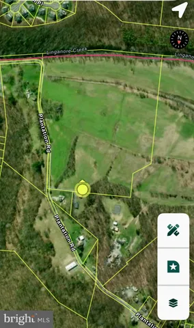 a view of a fan and a swimming pool