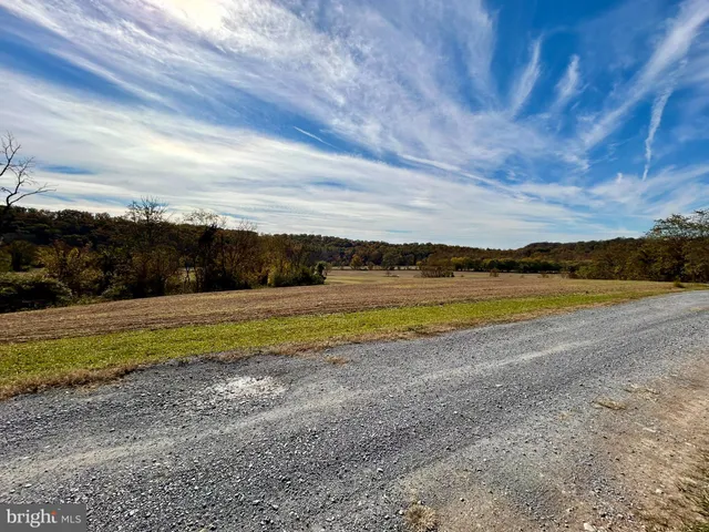 a view of a lake with a big yard