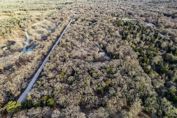a view of lake with green space