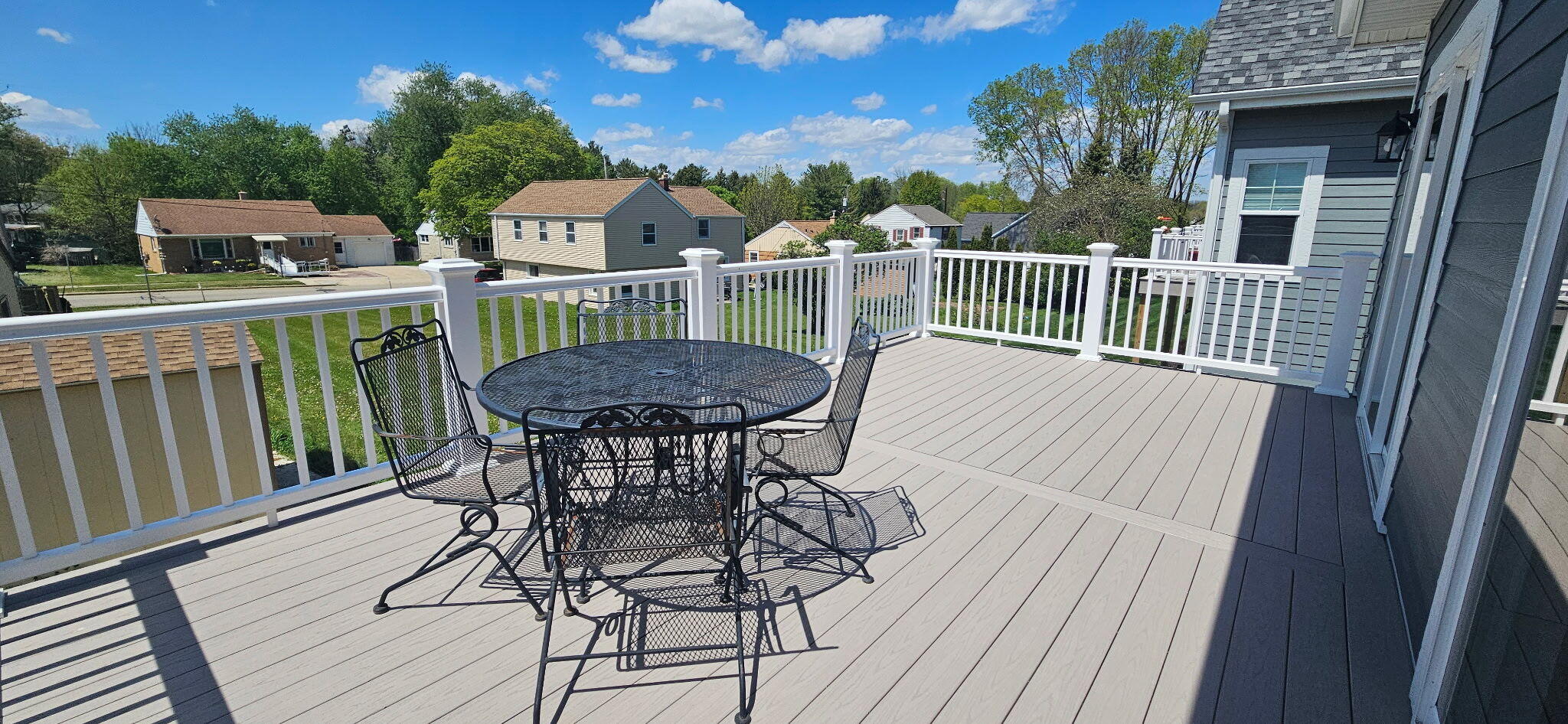 327 Sandy Circle Pewaukee, WI 53072 - Photo 24 of 40 Deck with lots of sunshine