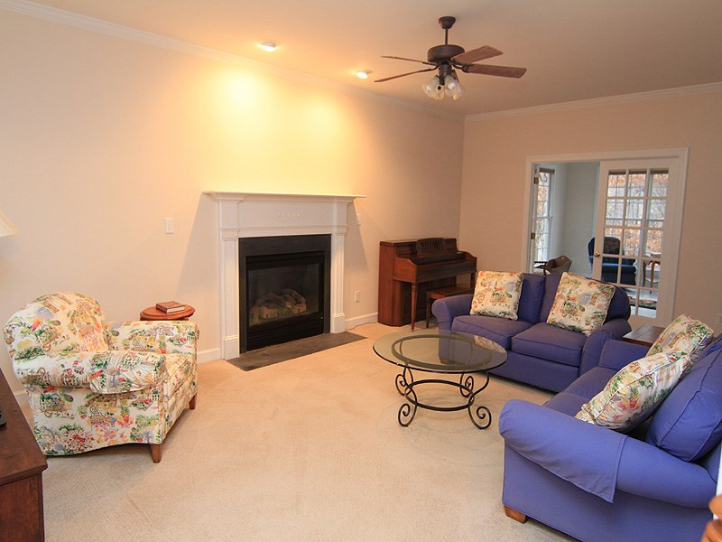 Enjoy the Gas Fireplace, Recessed Lights and cozy Carpeting. Living Room