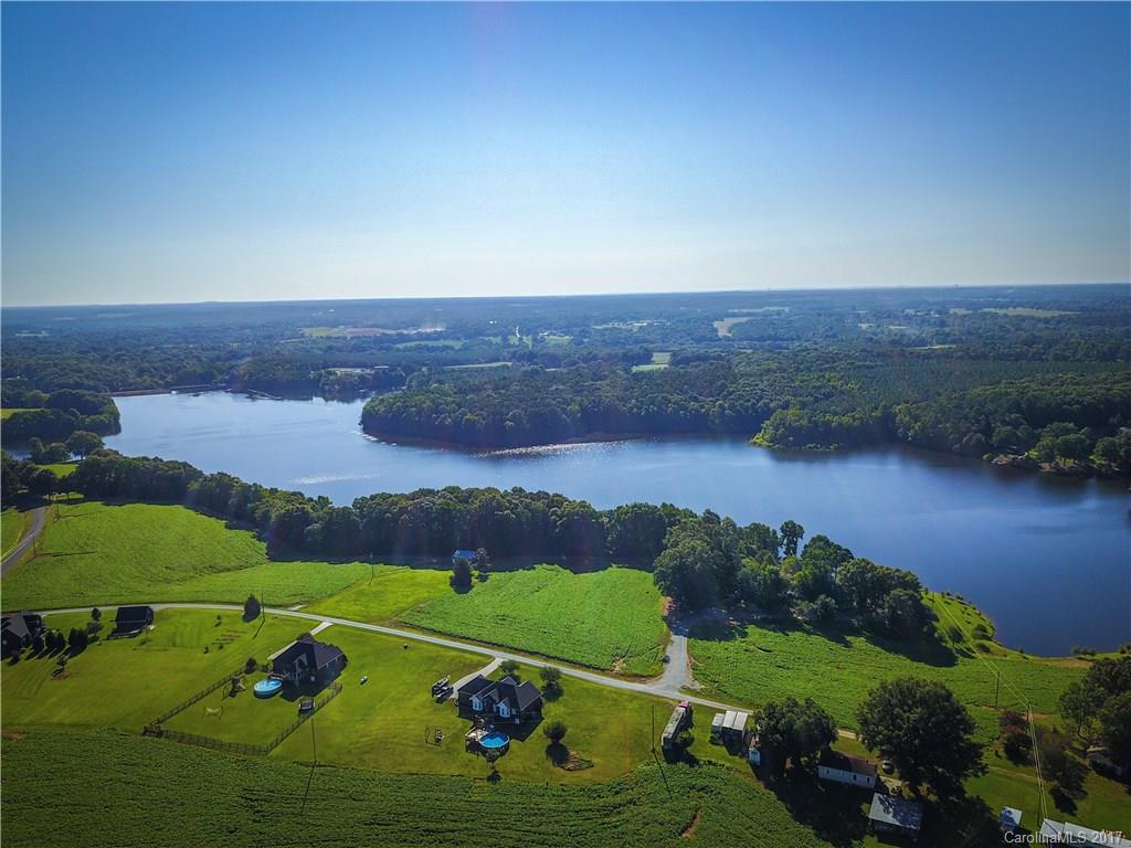 1406 Tomberlin Road, Unit 6 Monroe, NC 28110 - Photo 3 of 24 an aerial view of a houses with outdoor space and garden