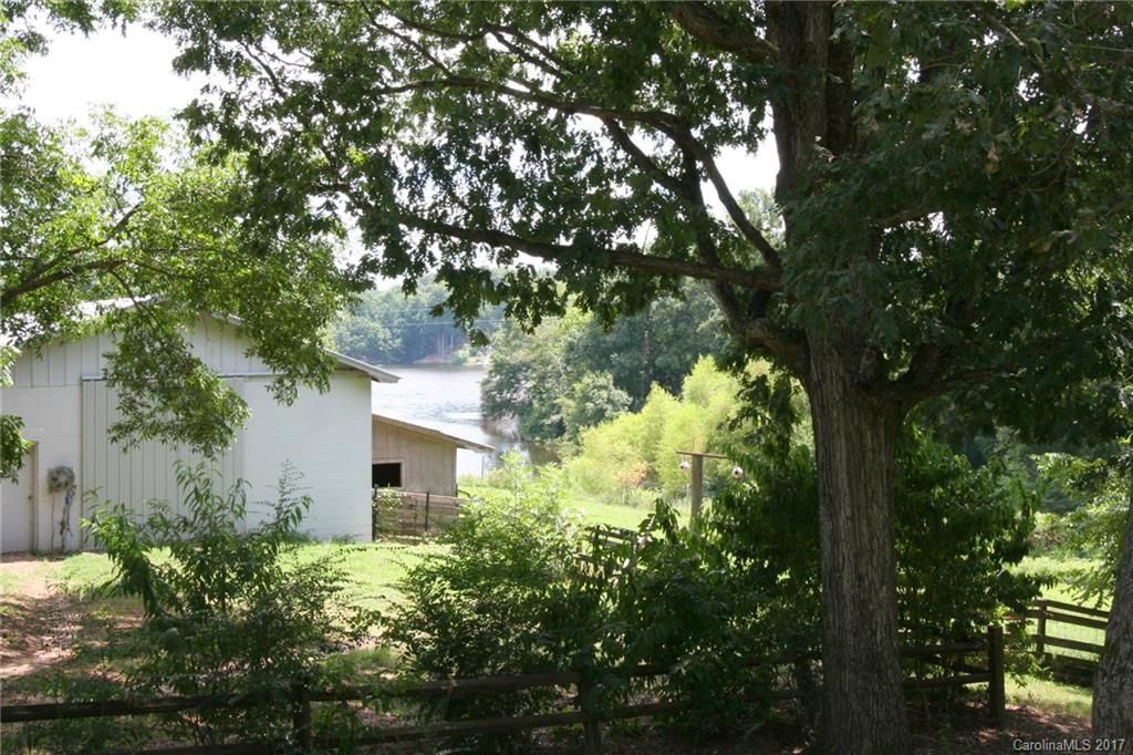 1406 Tomberlin Road, Unit 6 Monroe, NC 28110 - Photo 22 of 24 a view of a house with a tree
