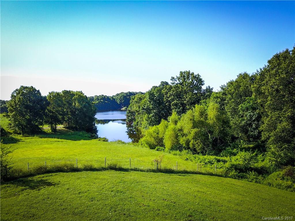 1406 Tomberlin Road, Unit 6 Monroe, NC 28110 - Photo 4 of 24 a view of a golf course with a garden