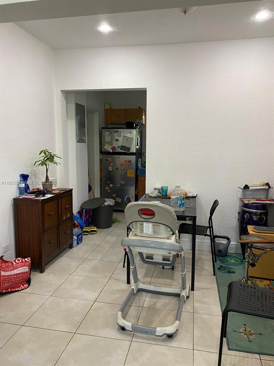 851 80th Street Miami Beach, FL 33141 - Photo 2 of 5 a view of a workspace with furniture