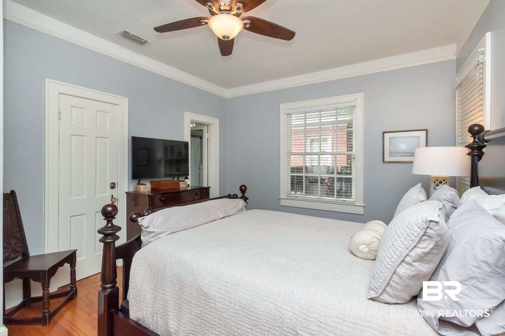 128 Silverwood Street Mobile, AL 36607 - Photo 17 of 34 Bedroom with hardwood / wood-style floors, ceiling fan, and crown molding