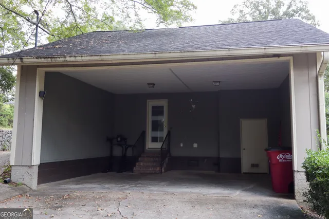 a closeup of a house with potted plants