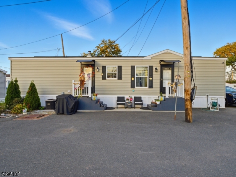 18 3rd Street Woodbridge, NJ 07001 - Photo 10 of 10 a view of a house with a patio