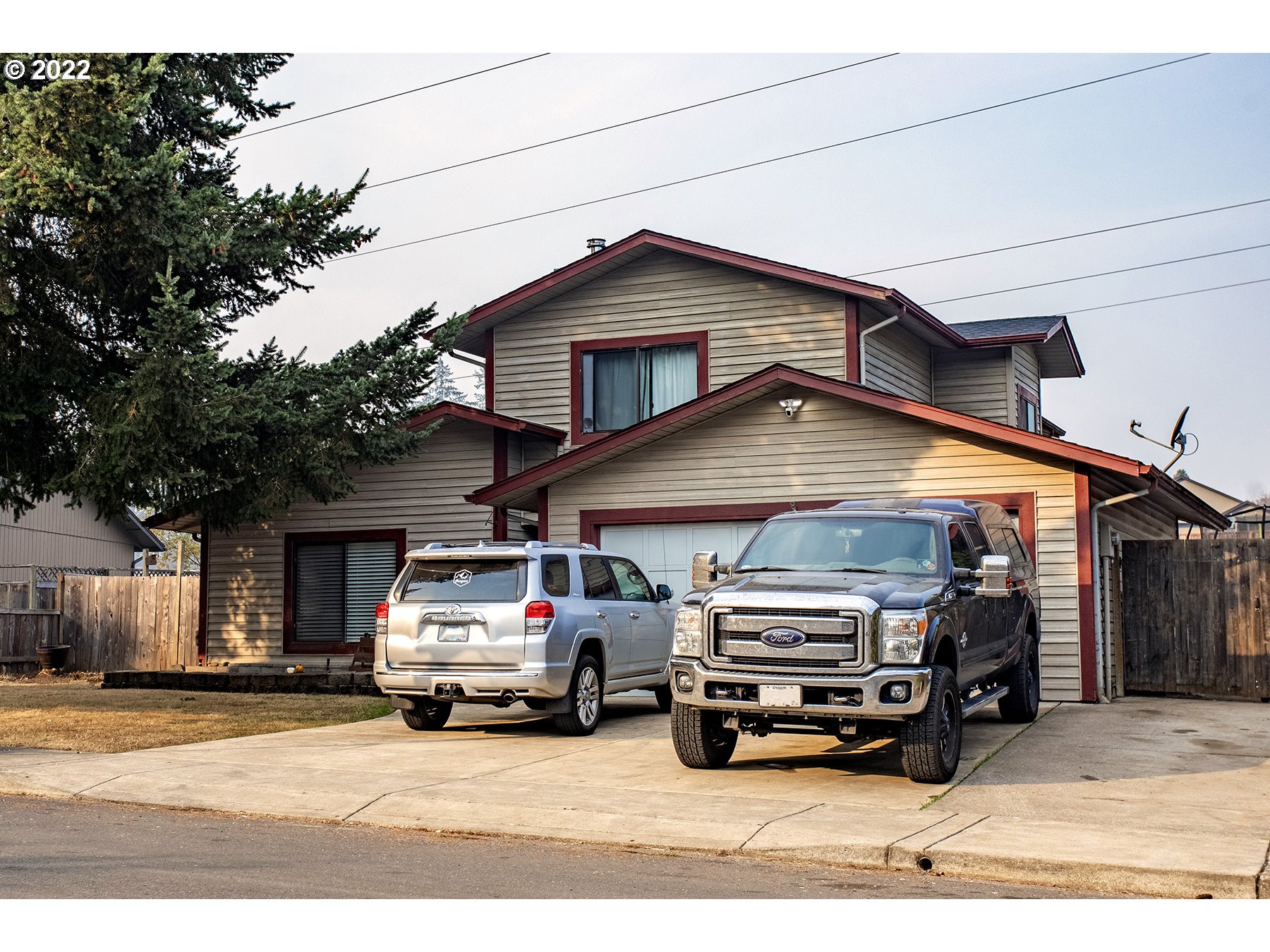 a car parked in front of a house