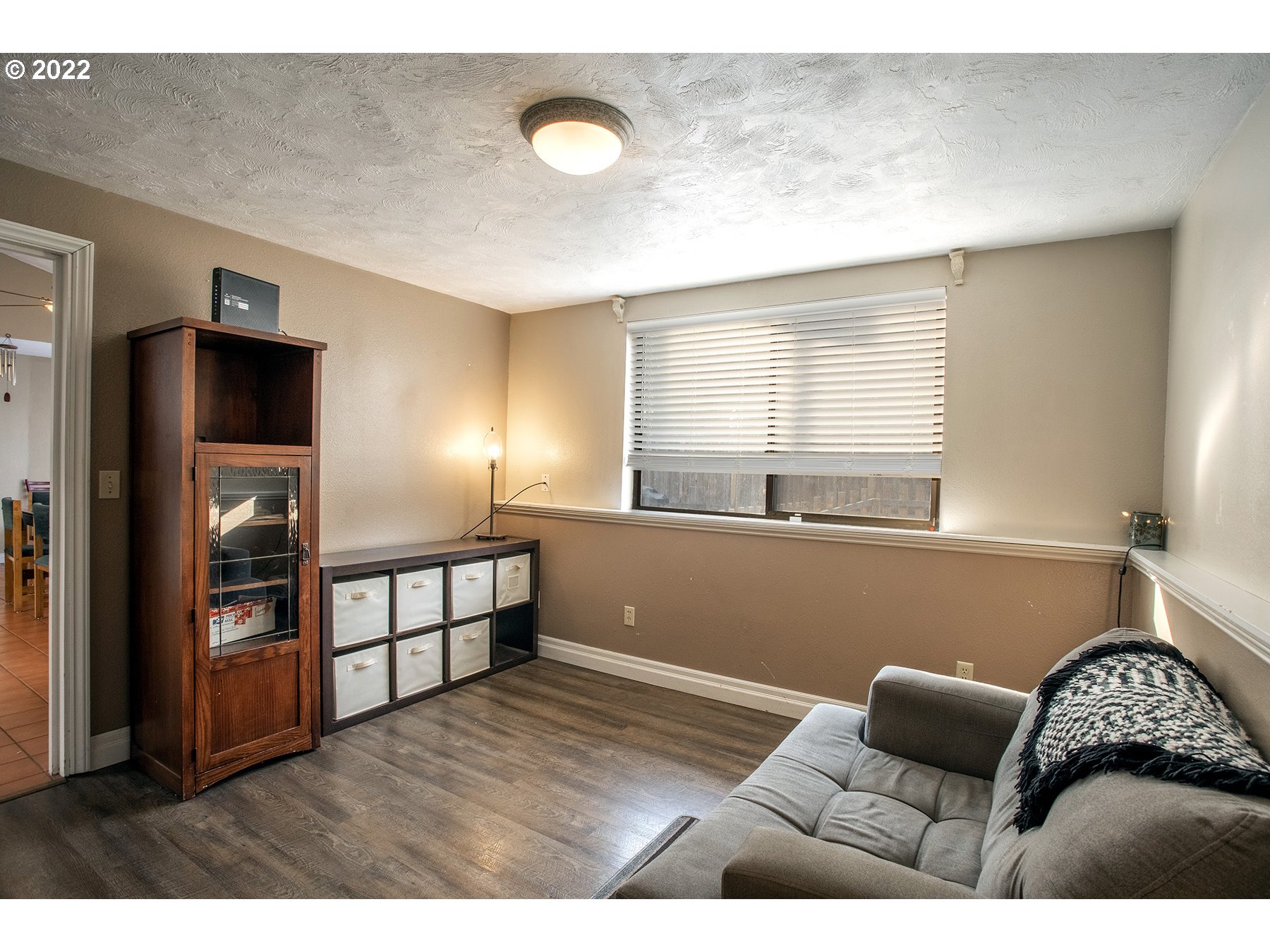 968 South 55th Place Springfield, OR 97478 - Photo 16 of 32 a living room with furniture and a window