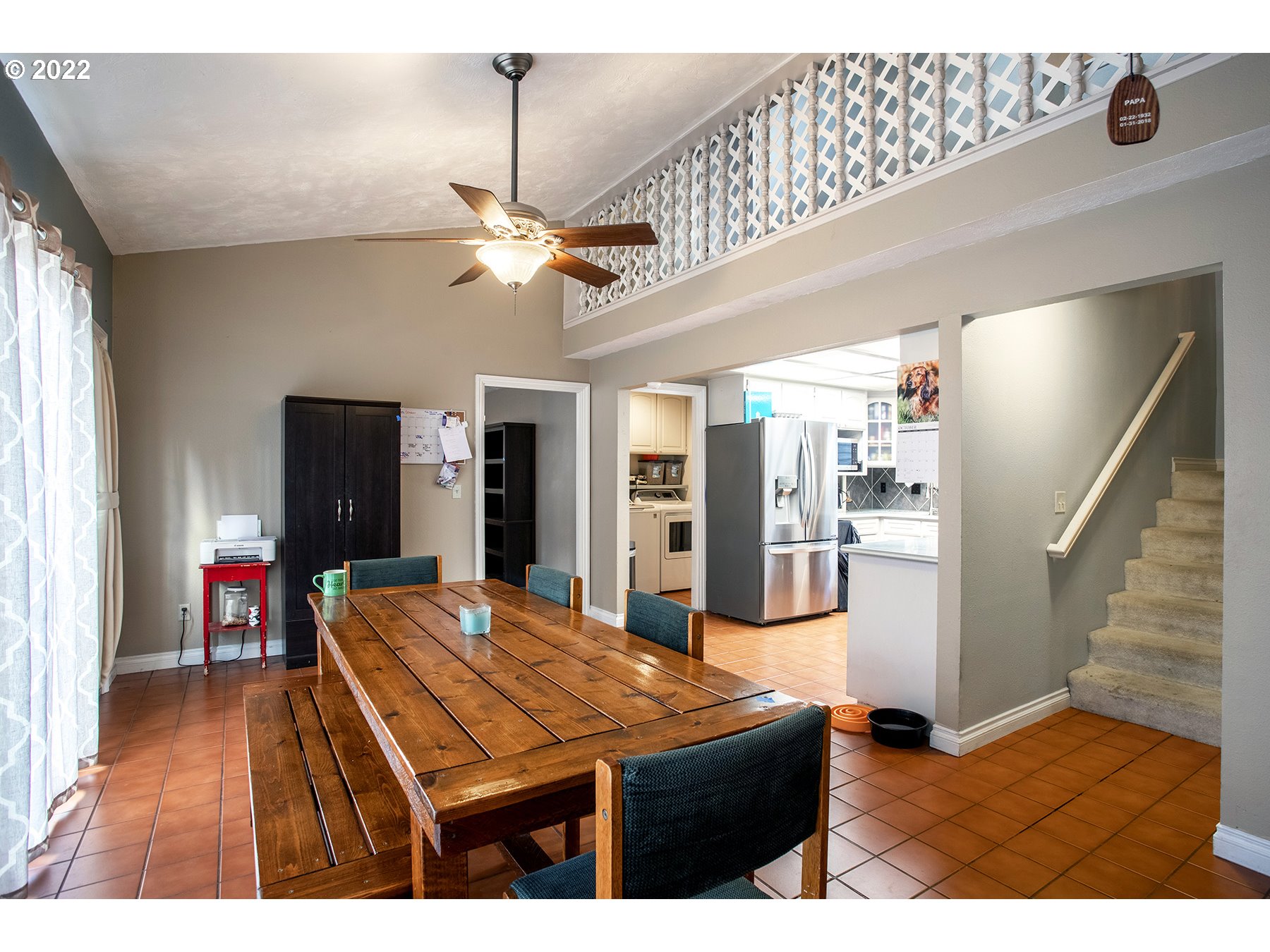 968 South 55th Place Springfield, OR 97478 - Photo 7 of 32 a kitchen with stainless steel appliances kitchen island a chandelier