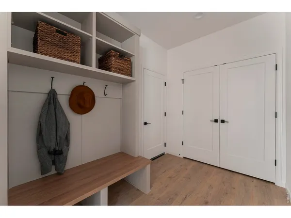 a view of entryway with wooden floor