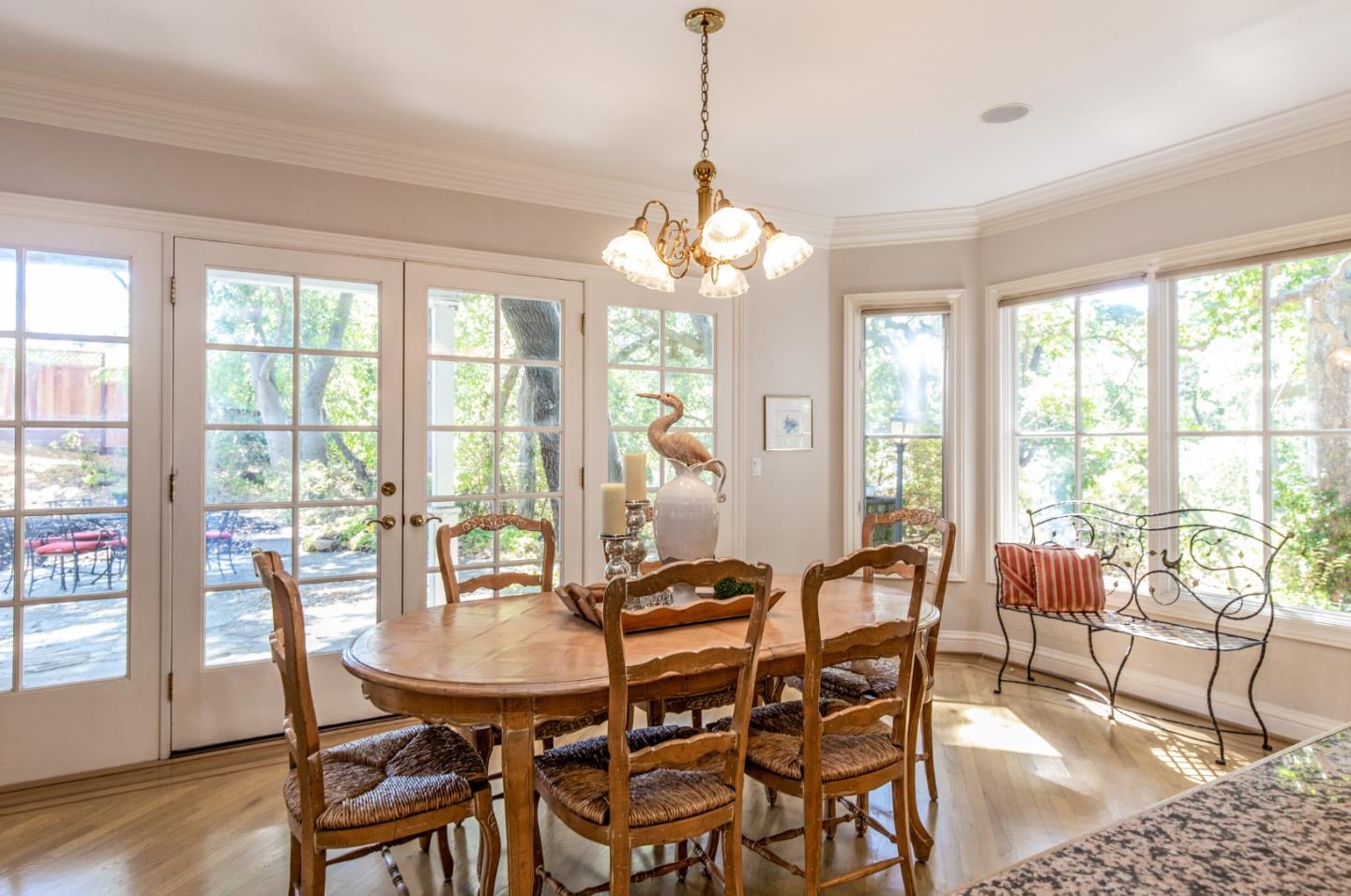 18540 Bicknell Road Monte Sereno, CA 95030 - Photo 14 of 51 a view of a dining room with furniture window and wooden floor