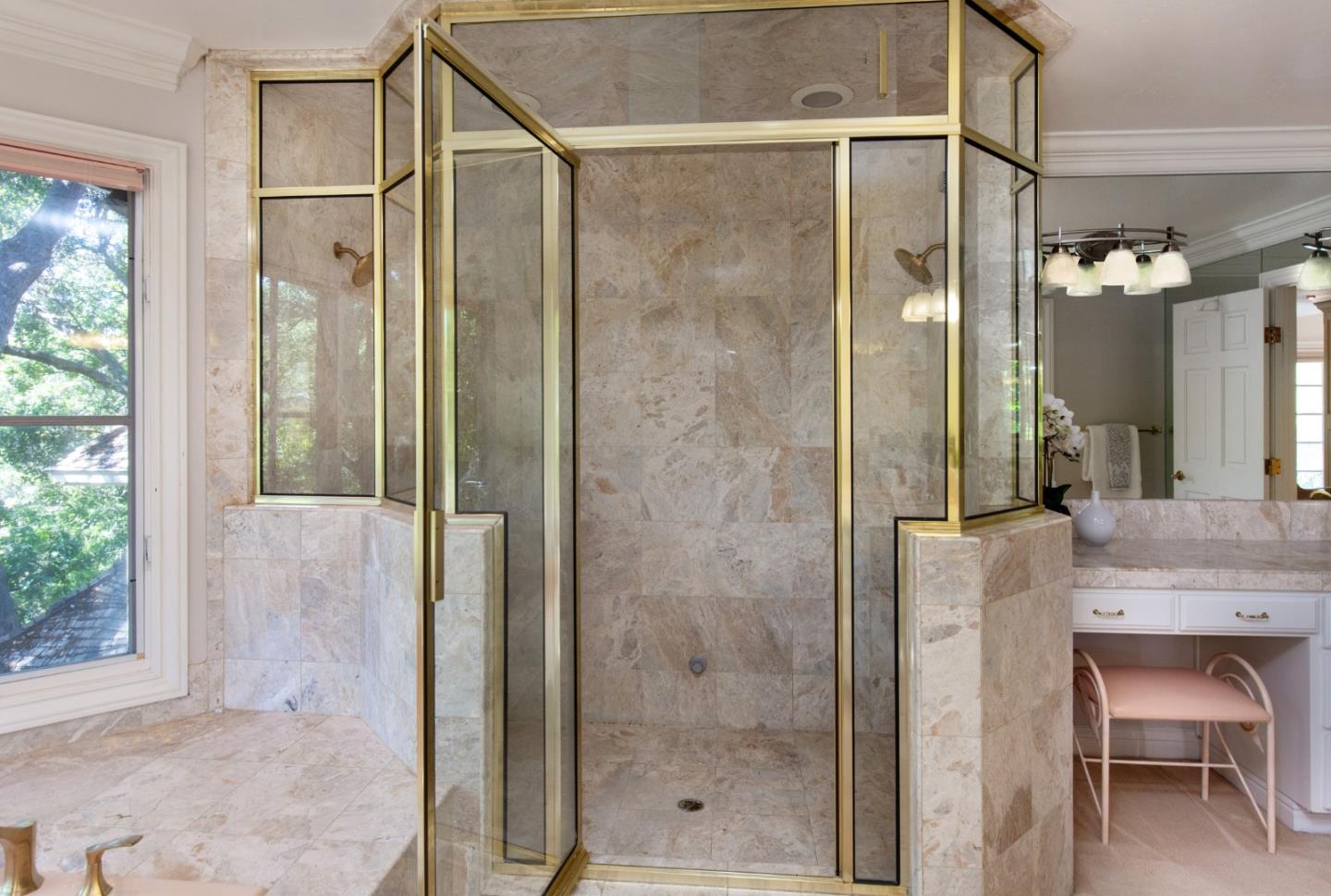 18540 Bicknell Road Monte Sereno, CA 95030 - Photo 18 of 51 a bathroom with a shower and a sink