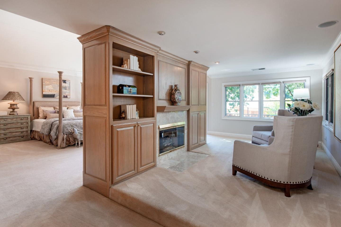 18540 Bicknell Road Monte Sereno, CA 95030 - Photo 23 of 51 a living room with furniture and a fireplace