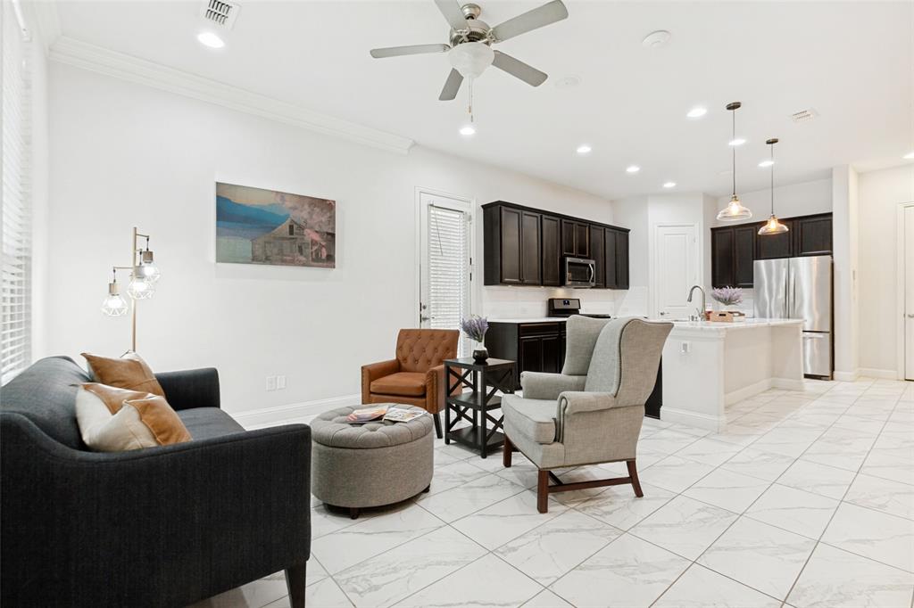 605 Ansley Way Allen, TX 75013 - Photo 6 of 28 Open-concept living space featuring high ceilings, recessed lighting, and a contemporary ceiling fan