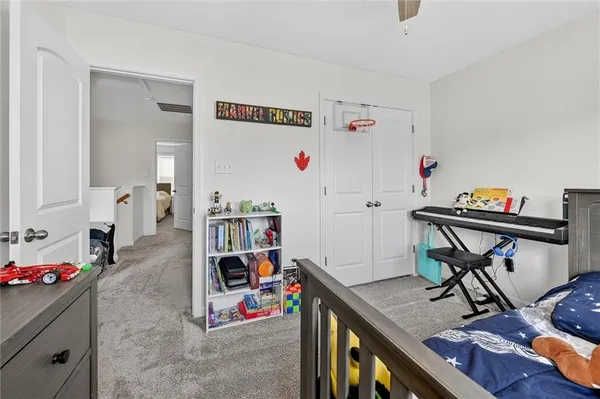a room with furniture and wooden floor