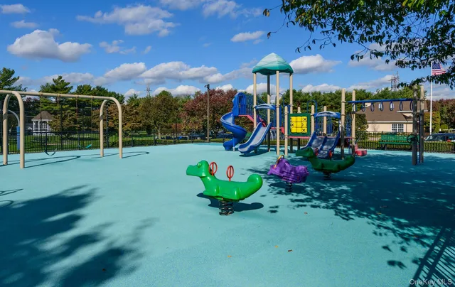 a street sign on a pole on a street