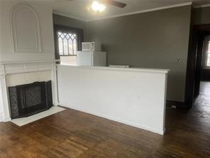 71 North Euclid Avenue, Unit 3 Pittsburgh, PA 15202 - Photo 10 of 18 a view of a livingroom with wooden floor and a fireplace