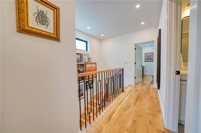 a view of a hallway with windows