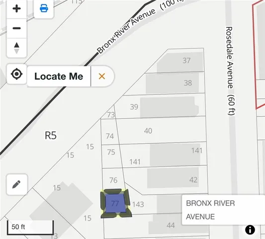 a view of a car parked in front of a house