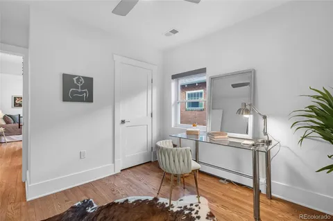 a workspace with furniture and window