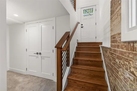 a view of an entryway with stairs