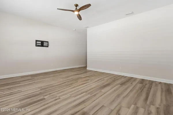 a bath tub sitting next to a window