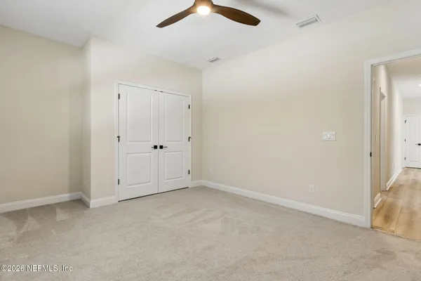 a view of a house with a garden