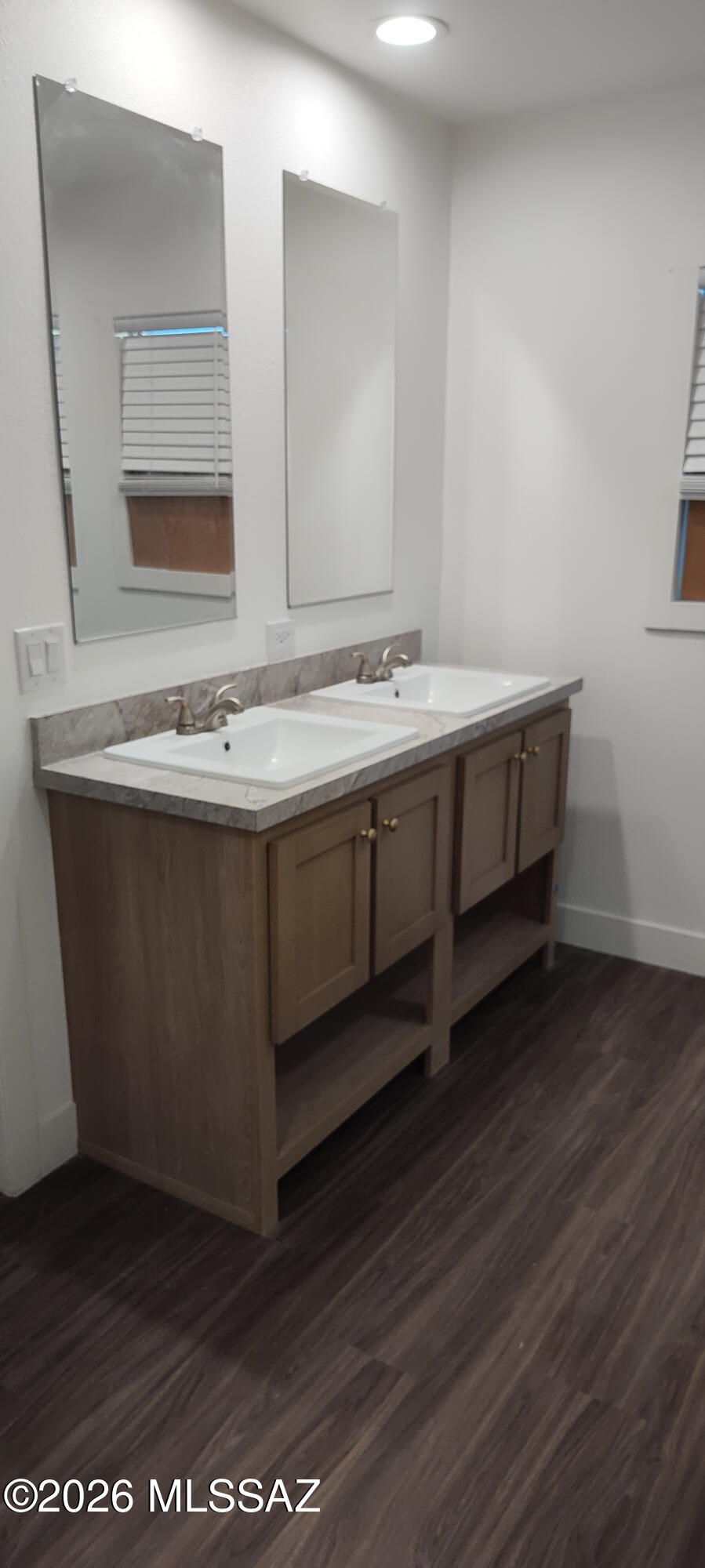 18565 West McClean Road Marana, AZ 85653 - Photo 17 of 37 a bathroom with a sink and a mirror