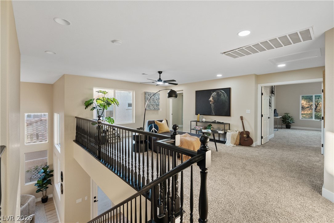 1662 Ravanusa Drive Henderson, NV 89052 - Photo 48 of 74 A versatile open loft space offers additional living quarters.