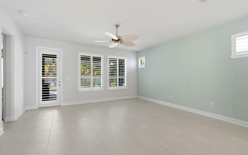 2535 Fireflag Lane Sarasota, FL 34232 - Photo 12 of 27 a view of an empty room with a window