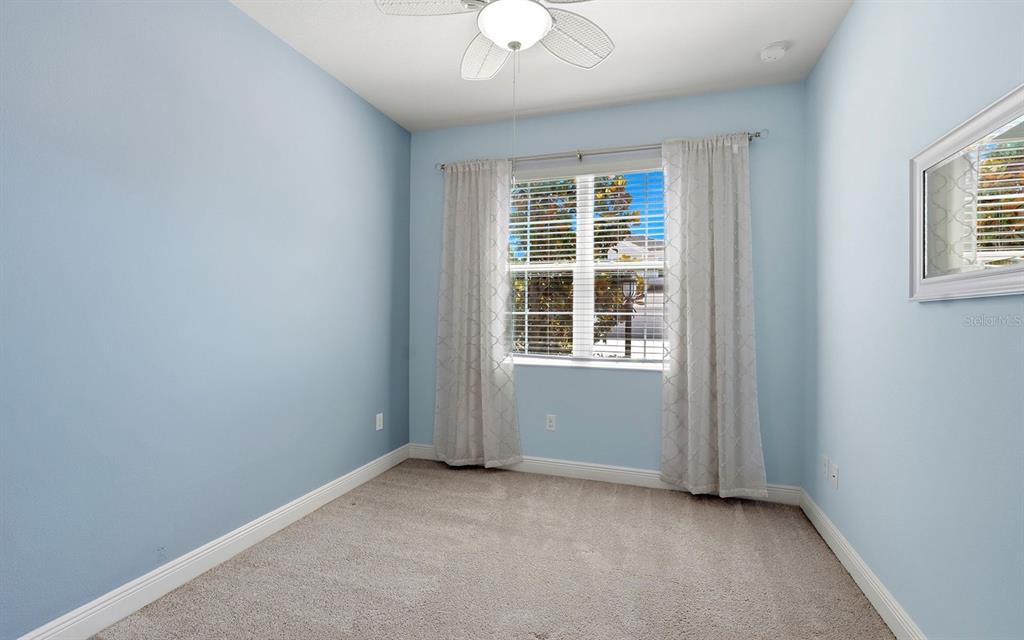 2535 Fireflag Lane Sarasota, FL 34232 - Photo 18 of 27 an empty room with a window
