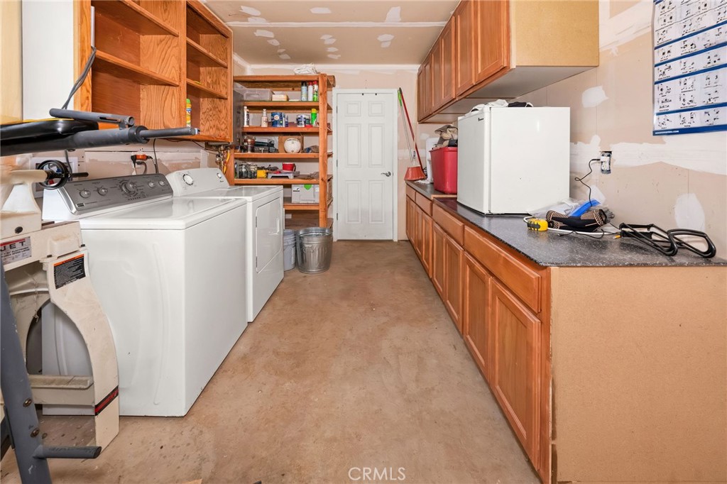 2728 Pentz Road Oroville, CA 95965 - Photo 39 of 52 a kitchen with stainless steel appliances granite countertop a stove a sink and a refrigerator