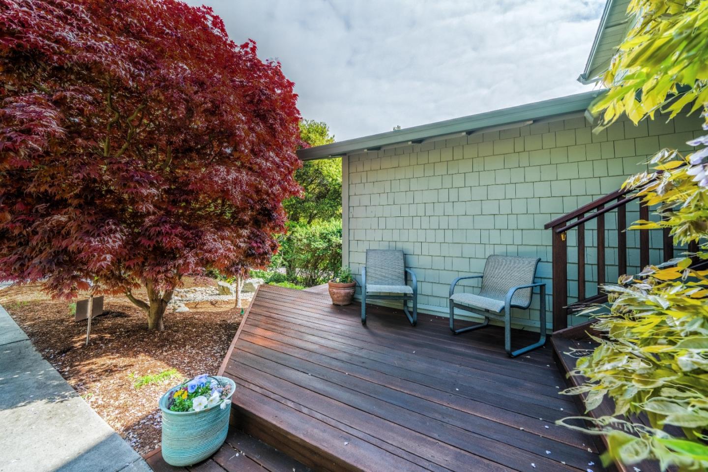 533 La Honda Drive Aptos, CA 95003 - Photo 11 of 44 a backyard of a house with outdoor seating