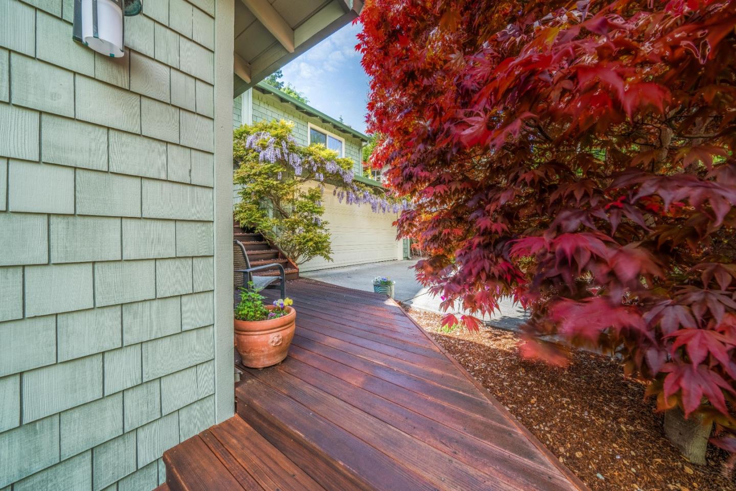 533 La Honda Drive Aptos, CA 95003 - Photo 31 of 44 a view of a porch with a potted plant